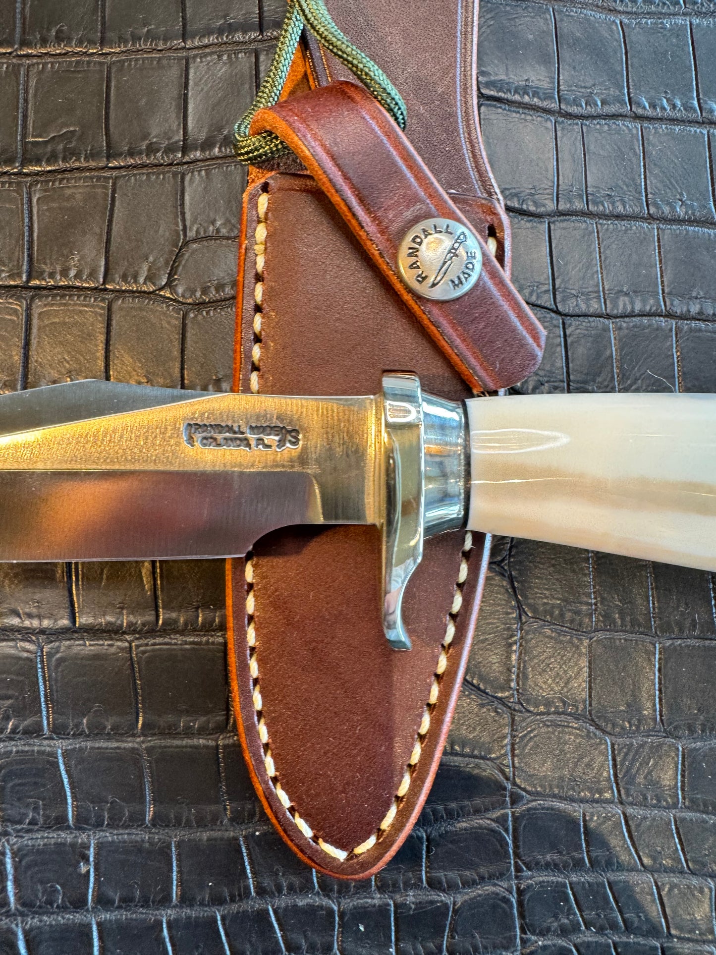News in Paper Randall Model 8-4 in a gorgeous piece of Cream and Blue Fossil Walrus Ivory. Nickel Silver single hilt with a nickel Collar and butt cap.