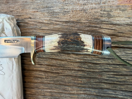 New in paper Randall Knife Model 25-6 Trapper in Stag Leather Handle Stainless Blade, NSH