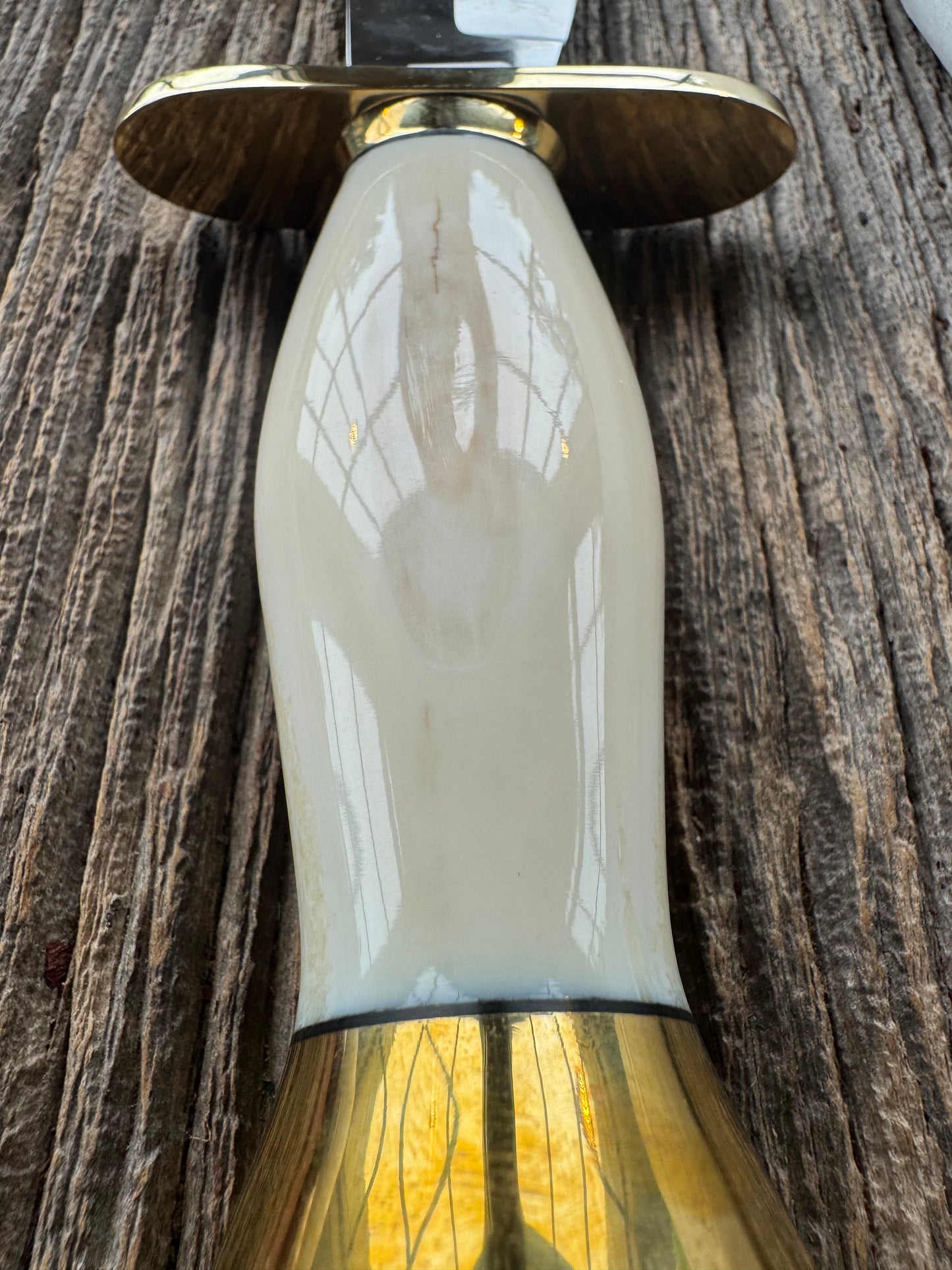 New in paper Randall Knife Model 12-8 Big Bear. Gorgeous piece of off white Fossil Walrus Ivory. Brass hilt, collar and butt cap, Stainless steel.