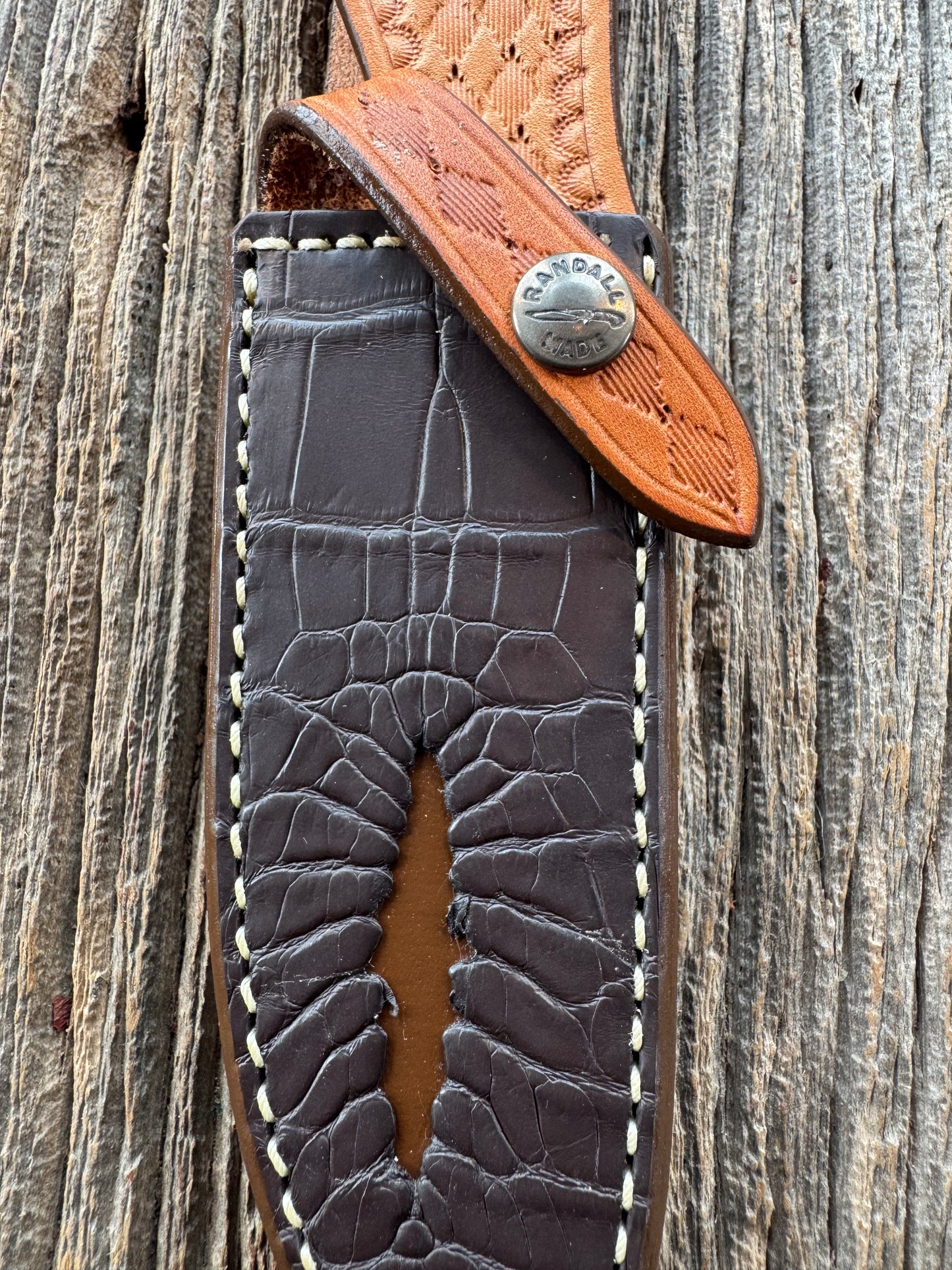New Randall Model Combat Companion Sheath in Exotic Brown Natural Croc with full leather hand tooled belt loop. Randall snap and stamp on the back. Custom Made at Sullivan’s by Gutcher