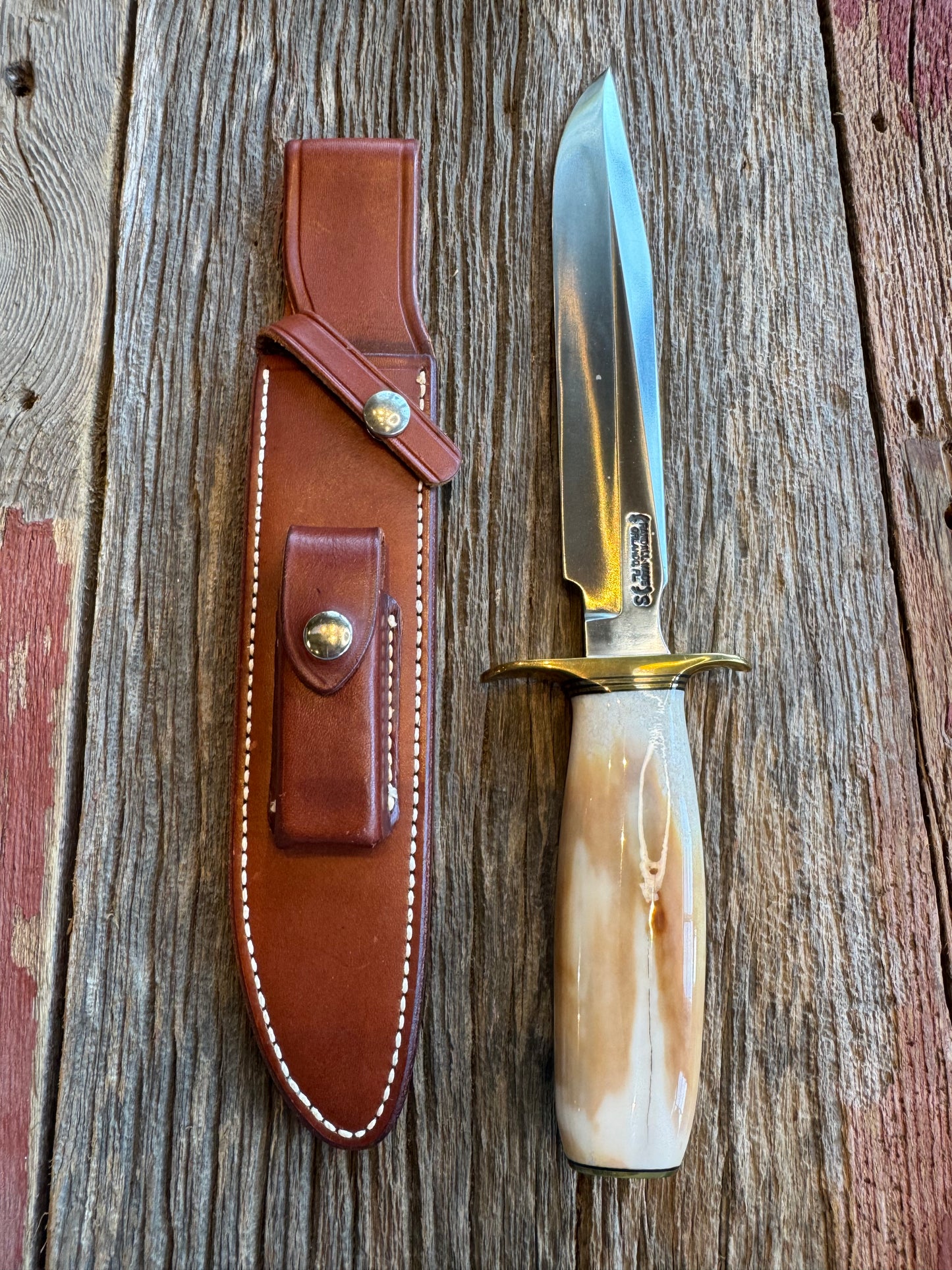 Randall Knife Model 1-8 Creamy Fossil Walrus Handle. From the Jim Gates Collection via Rick Bowles. Stainless Steel, Brass Hilt and butt plate.