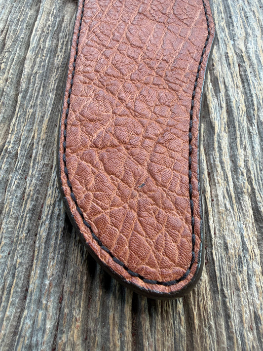New Randall Model 12-11 Confederate Sheath in Exotic thick and textured Rust colored Elephant hide on brown leather from Treeman with a black Canteen snap. Hand tooled belt loop. Killer sheath.