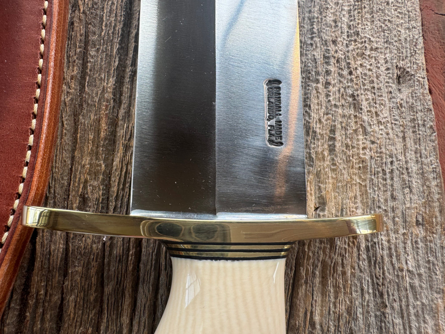New in Paper Model 12-11 Smithsonian “Smitty” Bowie. Beautiful Dave Warthers Resin with a finger grip and a Brass forward curved hilt and brass butt cap.