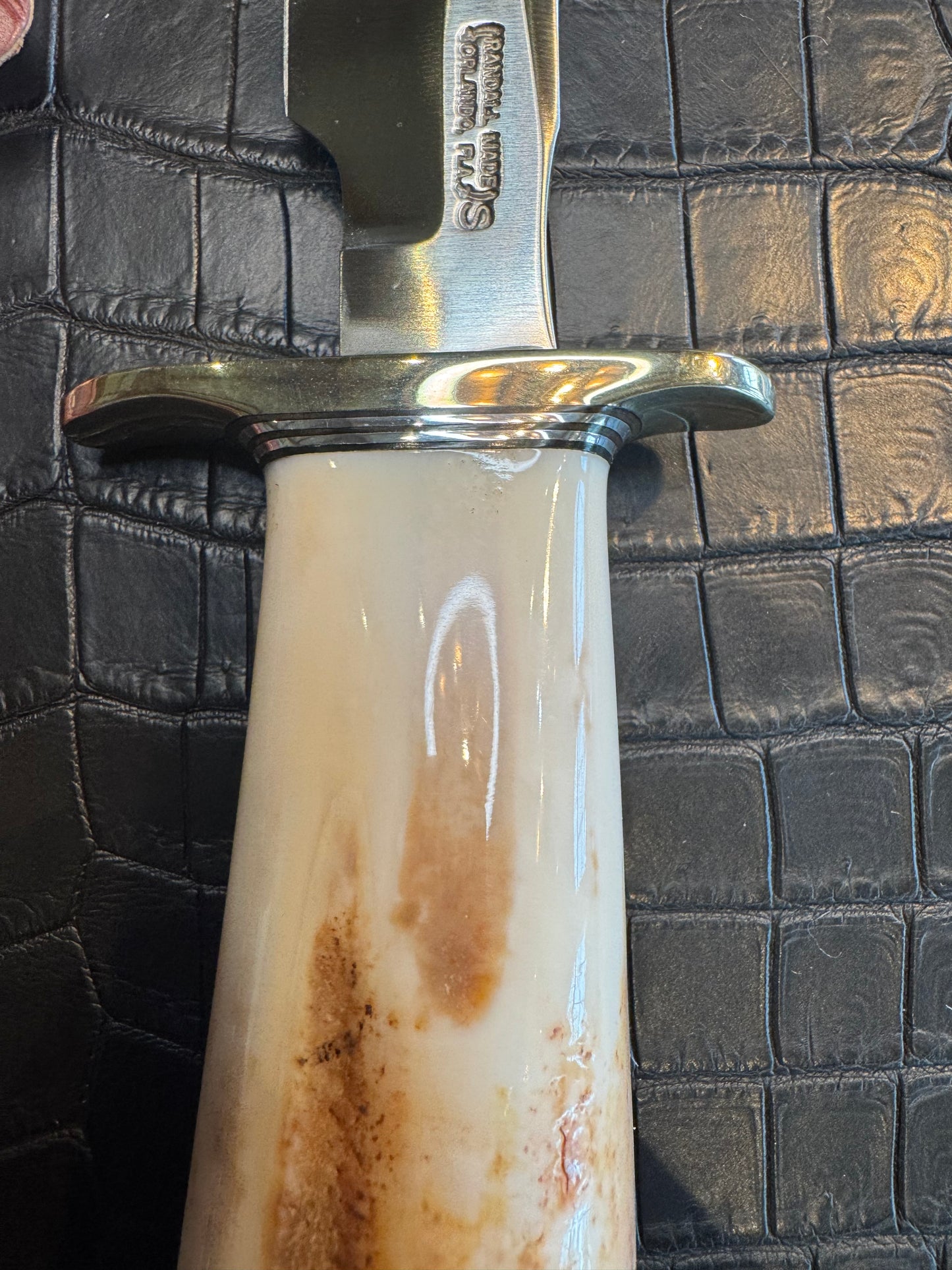 Randall Model 1-7 in a gorgeous beefy piece of Creamy Fossil Walrus Ivory. Nickel Silver Hilt and butt cap.