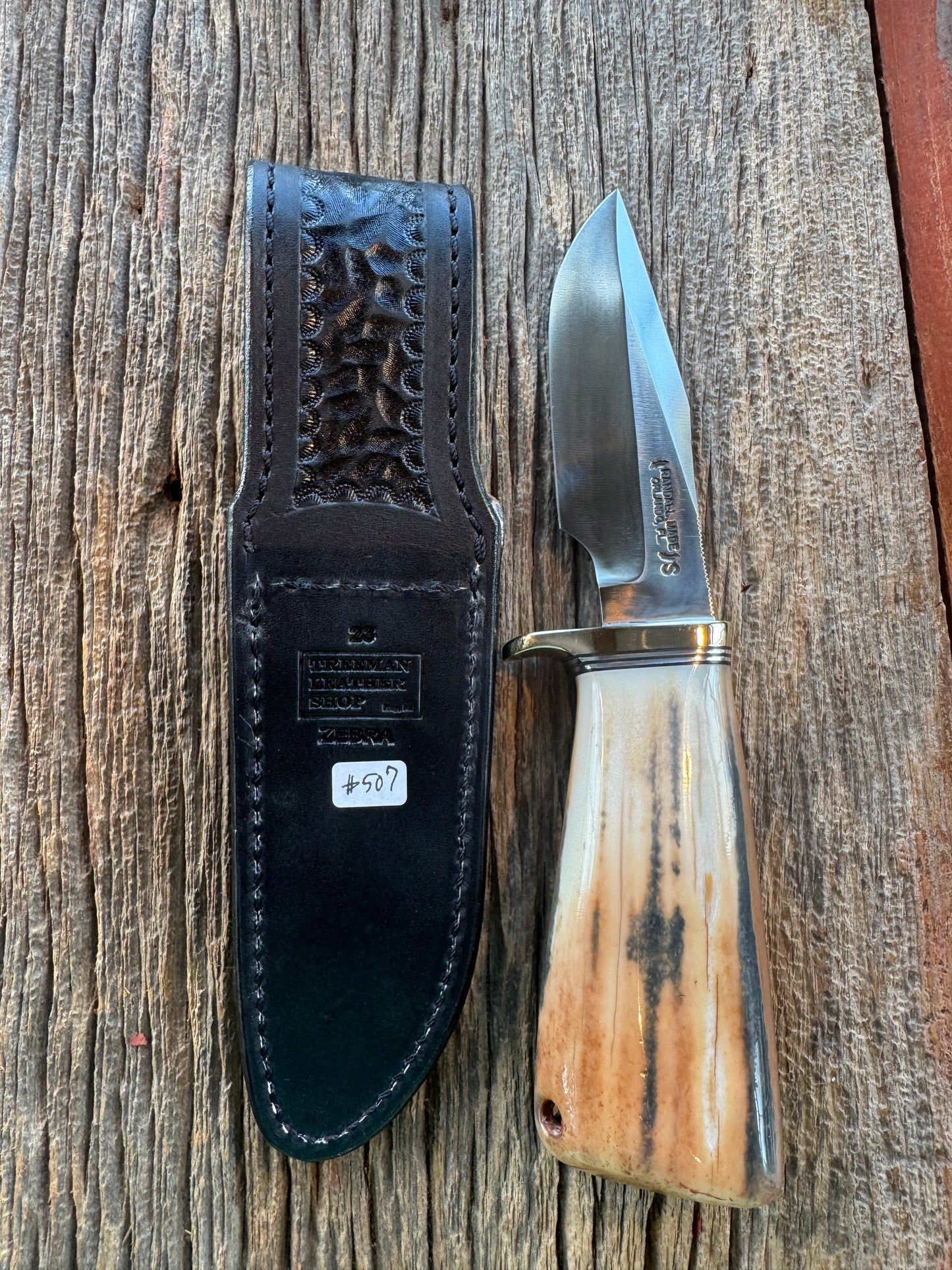 Randall Knife Model 23 Net Weight Artifact Fossil Walrus Handle. Stainless Steel, Natural end. Zebra Sheath.