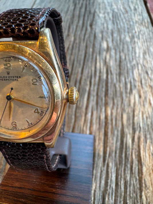 Vintage Rolex Oyster Perpetual Bubble Back circa 1940-1942 Rose Gold case with cream dial. Hirsch Lizard 18mm strap. No box or papers.