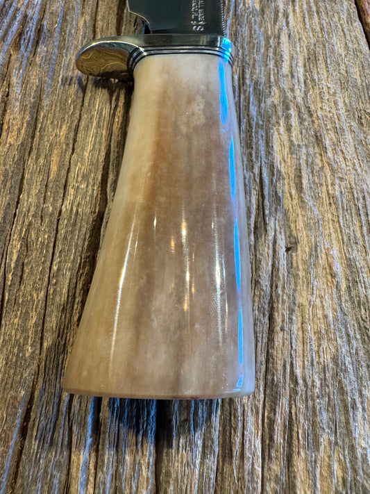 Randall Model 19-4 in Beautiful Fossil Walrus Ivory. Gorgeous colors and very rare to see a 19 in FWI. Nickel Silver Single Hilt and natural end, SS, and Flawless