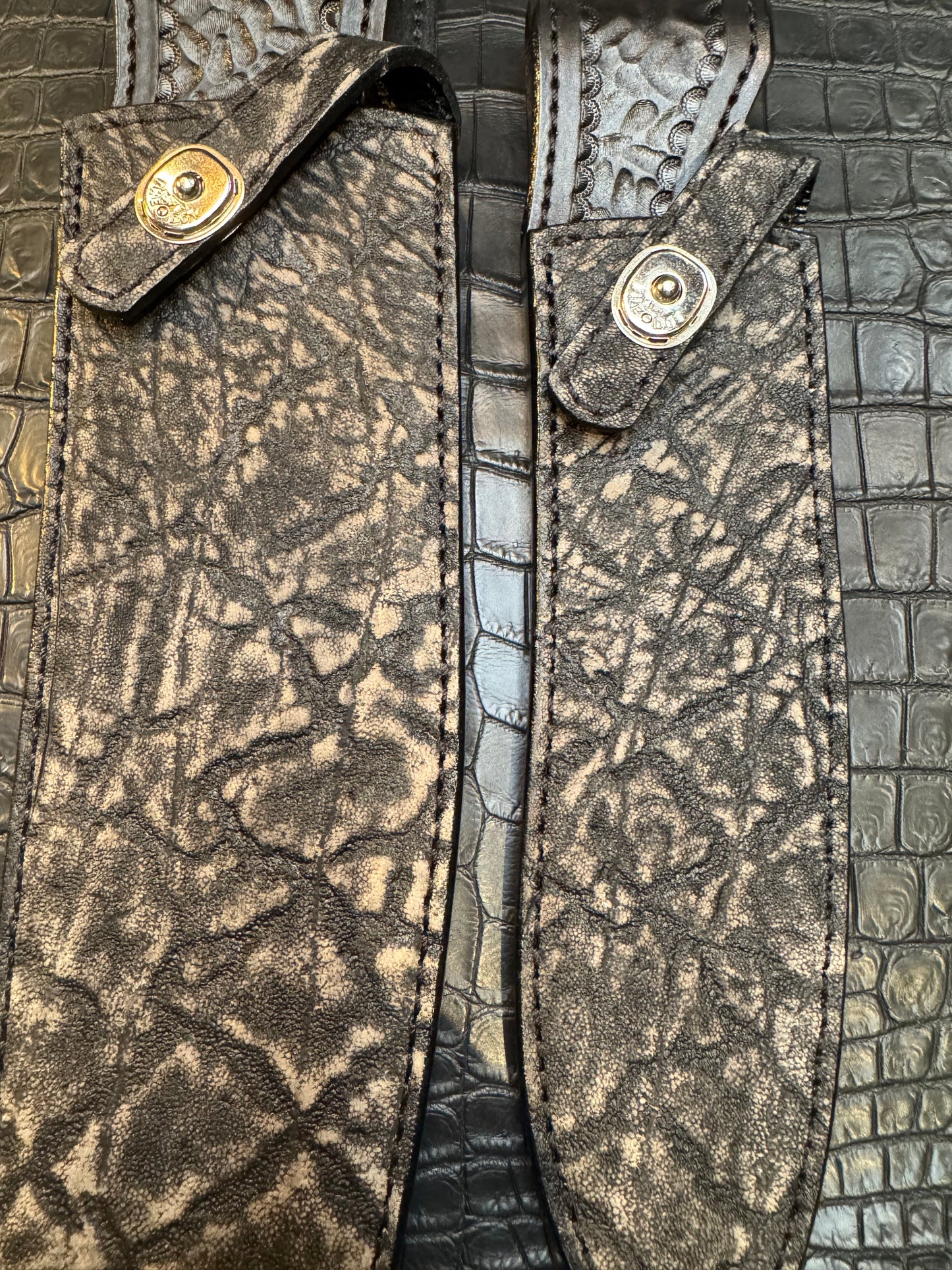 A pair of Randall Model 12-11 Large Sasquatch and Randall Model 12-8 Small Sasquatch Sheaths in Exotic Black Elephant by Treeman.
