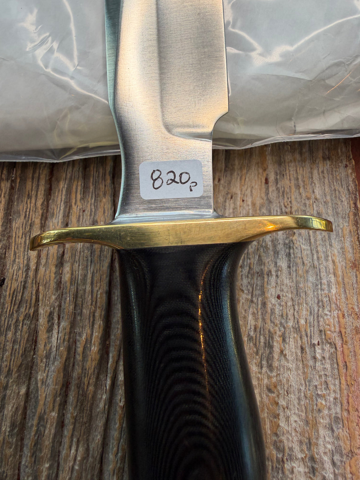 New in paper Randall Model 16 SP#1 Special fighter with a Black Micarta handle. SS blade, brass hilt. Lanyard. Brown leather sheath.