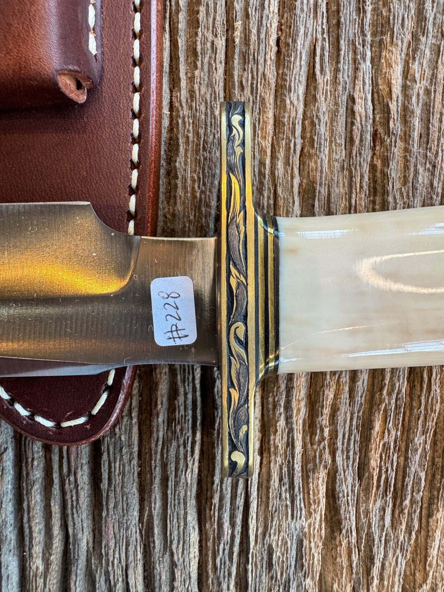 Randall Knife Model 1-7 FWI Handle. Jere Davidson engraved into Brass. Stainless Steel Blade. Stunning knife.