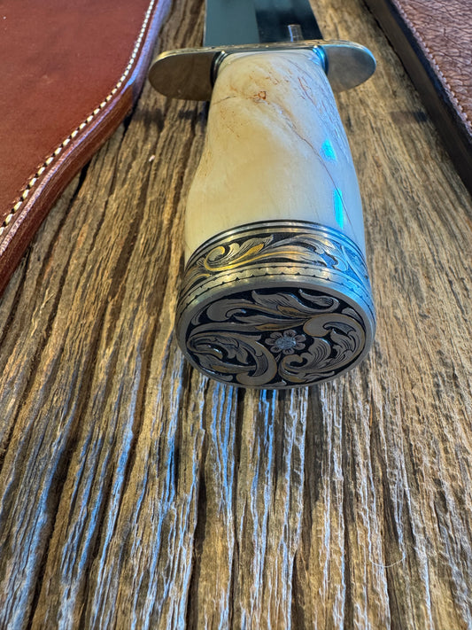 Rare Randall 12-11 Smithsonian with a huge piece of Beautiful Spiraled Narwal, Nickel Silver Hilt and butt cap both engraved and inlaid with copious amounts of gold and silver by Jere Davidson. Treeman Hippo Smitty Sheath included.