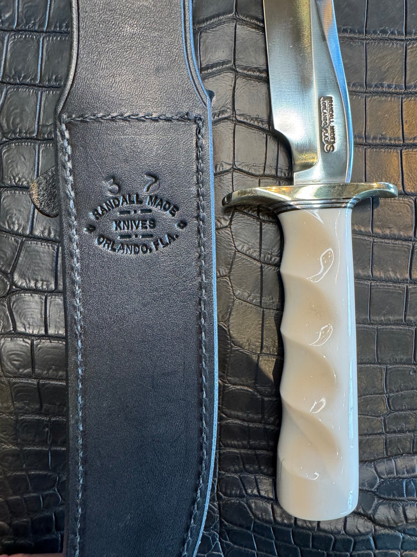 Randall Model 3-7 in Elephant Ivory with finger grooves and a natural end. Nickel Silver Hilt