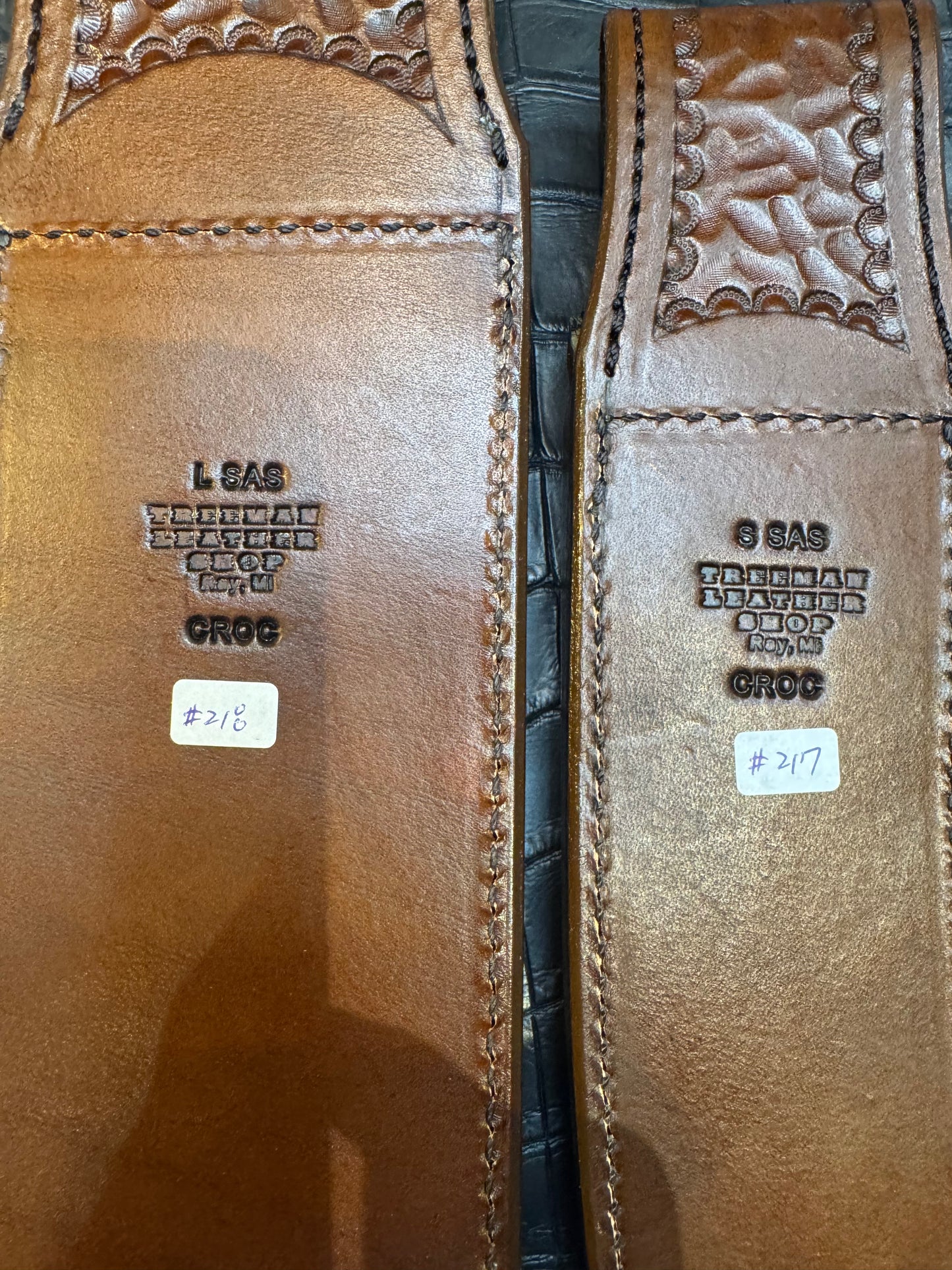 A pair of Randall Model 12-11 Large Sasquatch and Randall Model 12-8 Small Sasquatch Sheaths in Exotic Antique Brown Crocodile by Treeman.