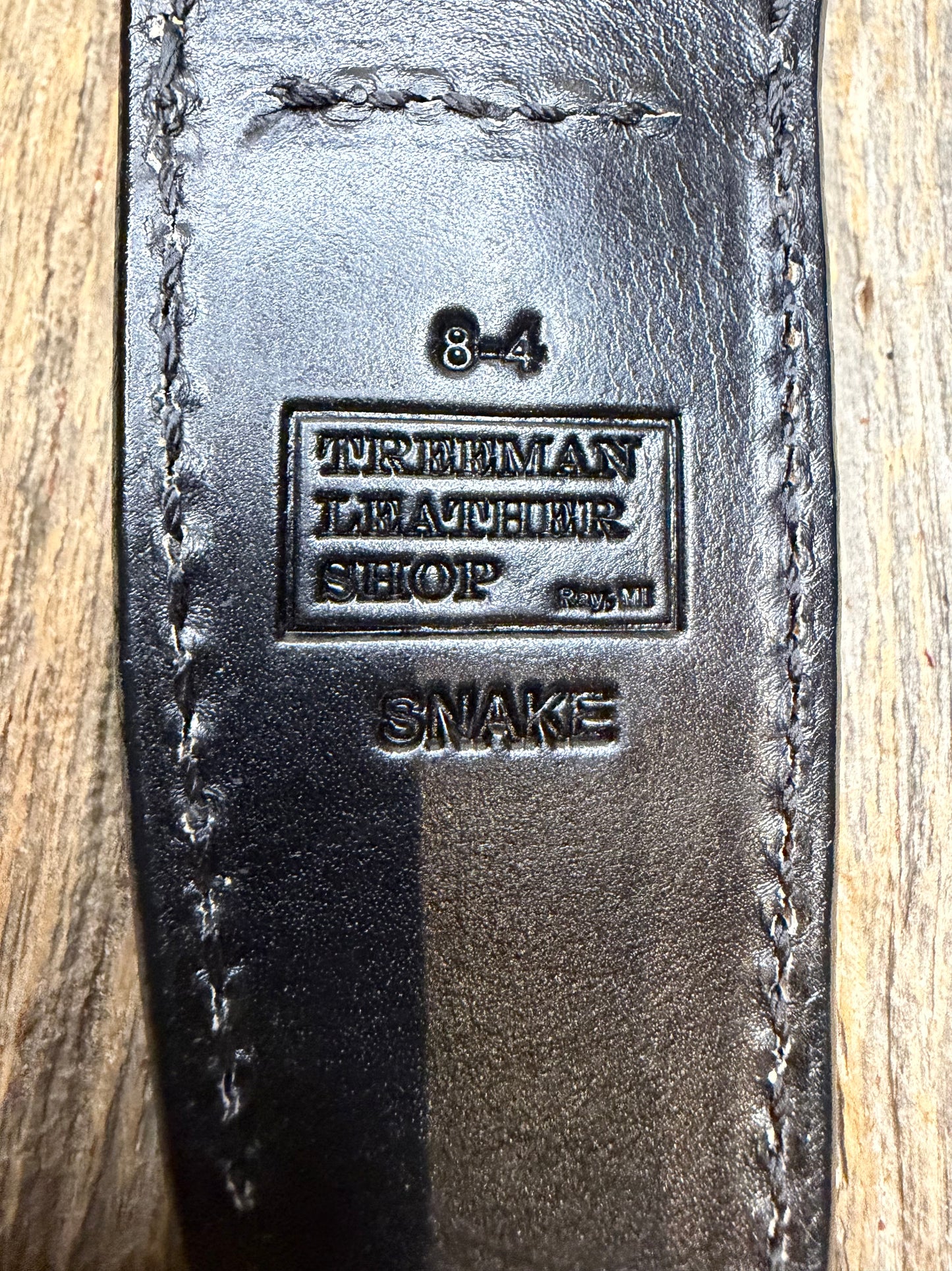 Randall Model 8-4 Sheath in Exotic Water Moccasin from Treeman Sheaths. Tremendous colors on this one.