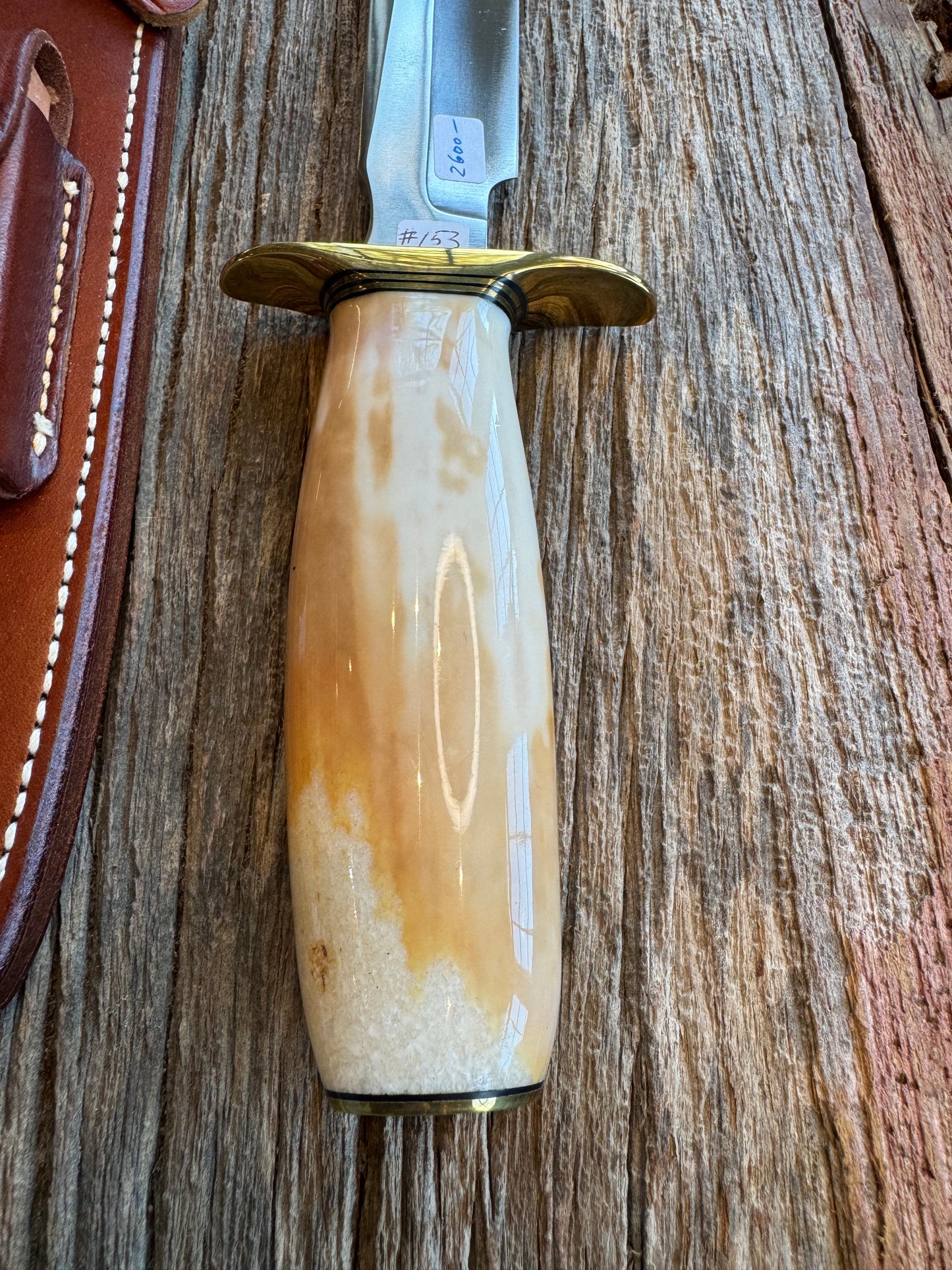 Randall Knife Model 1-8 Creamy Fossil Walrus Handle. From the Jim Gates Collection via Rick Bowles. Stainless Steel, Brass Hilt and butt plate.