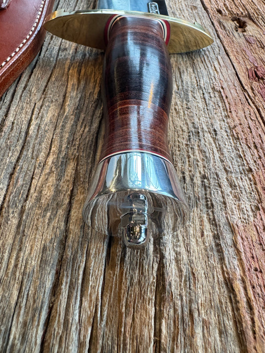 Model 12-11 Smithsonian Bowie. Leather stacked handle with a Brass lugged hilt. Green and white spacers.