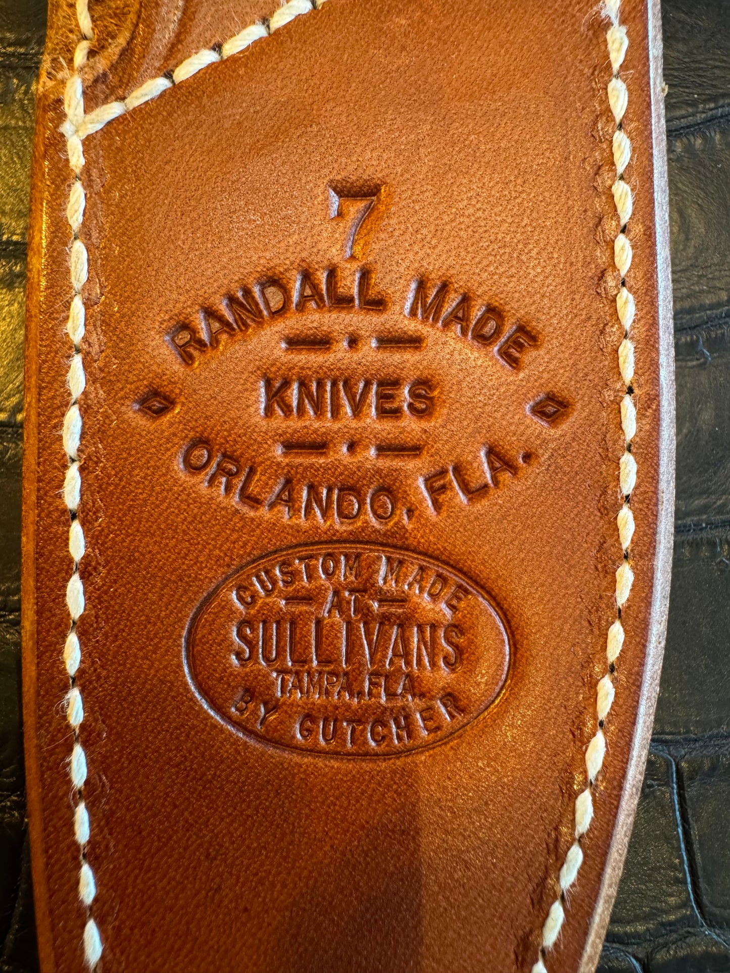 Randall Model 1-7 or 2-7 Exotic Snake skin in a low rise or high boy Sheath from Sullivans by Gutcher.