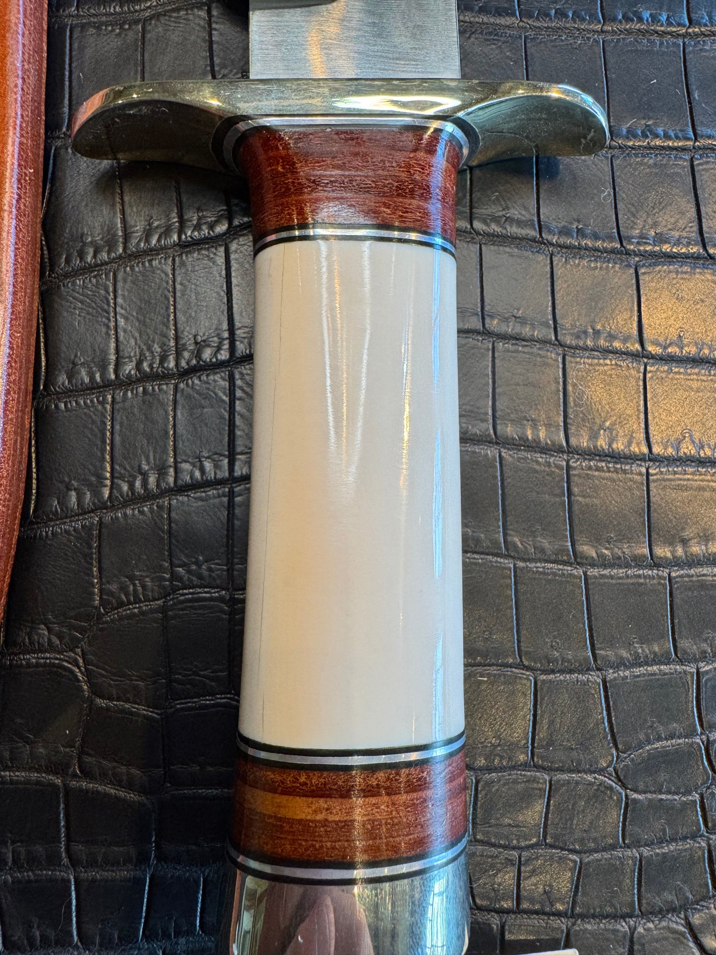 Randall Model 12/9-14 Grind Sportsman Bowie in Elephant Ivory with stacked Leather, Nickel Silver Hilt and Butt cap.