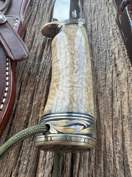 Randall Model Bowles Skinner Dealer Special Knife, perfect Musk Ox. This knife is a one of 4 per Rick Bowles. Beautifully engraved by Jere Davidson and adorned with gold and silver inlays.