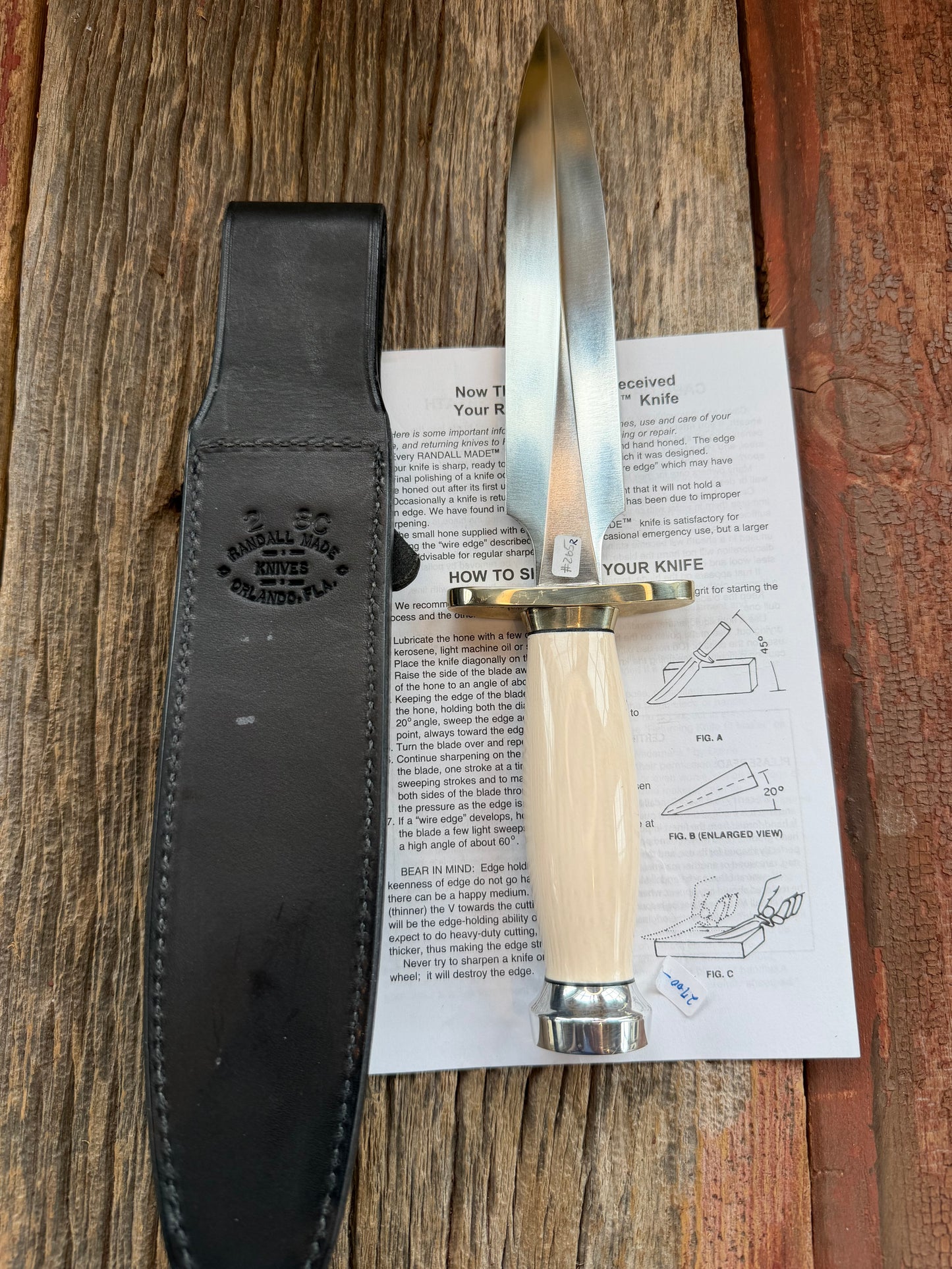 New Randall Knife Model 2-8 Warther Resin Ivory. Nickel Silver Hilt plus collar. Stainless Steel Blade, flanged butt cap.
