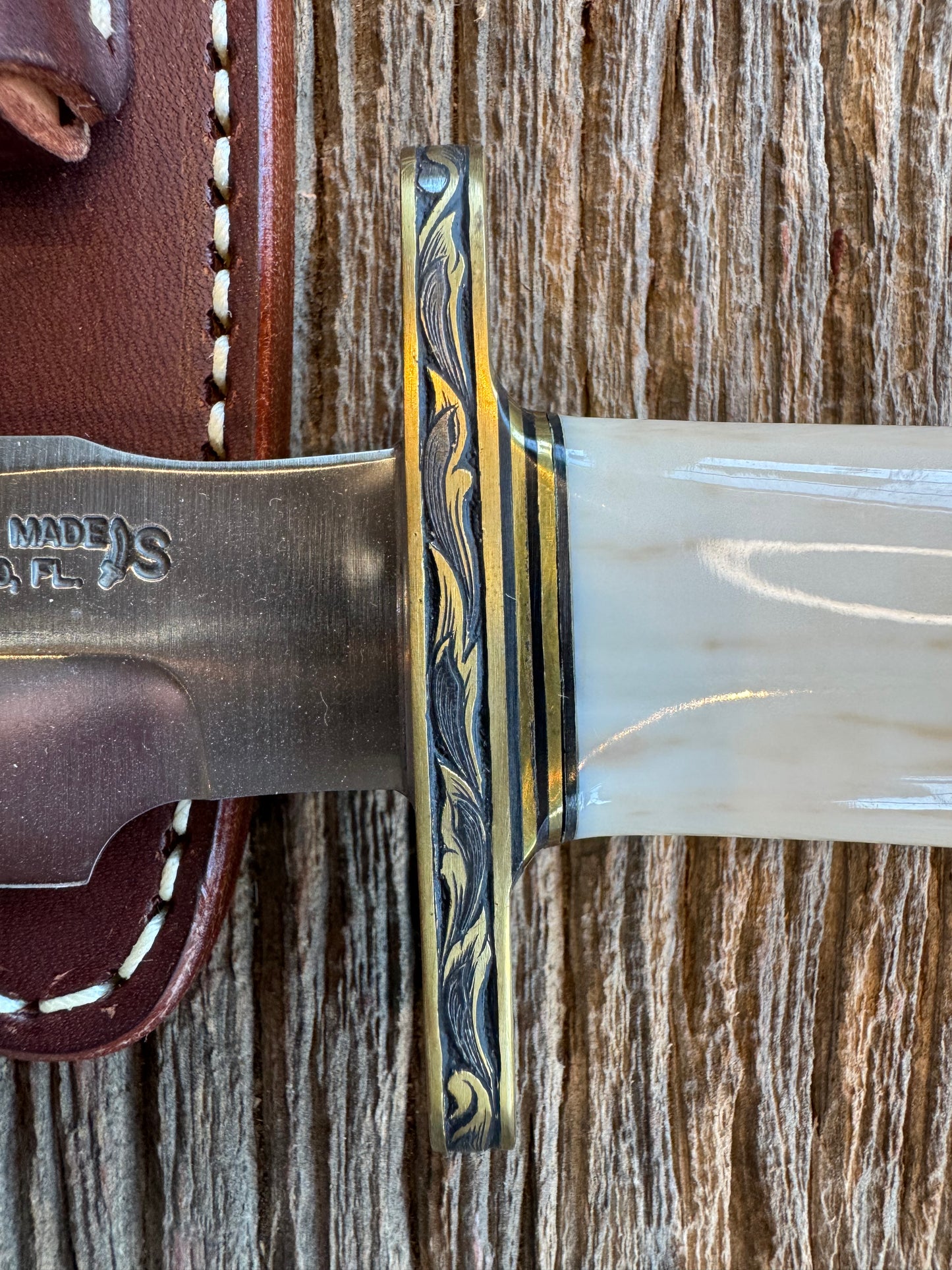 Randall Knife Model 1-7 FWI Handle. Jere Davidson engraved into Brass. Stainless Steel Blade. Stunning knife.