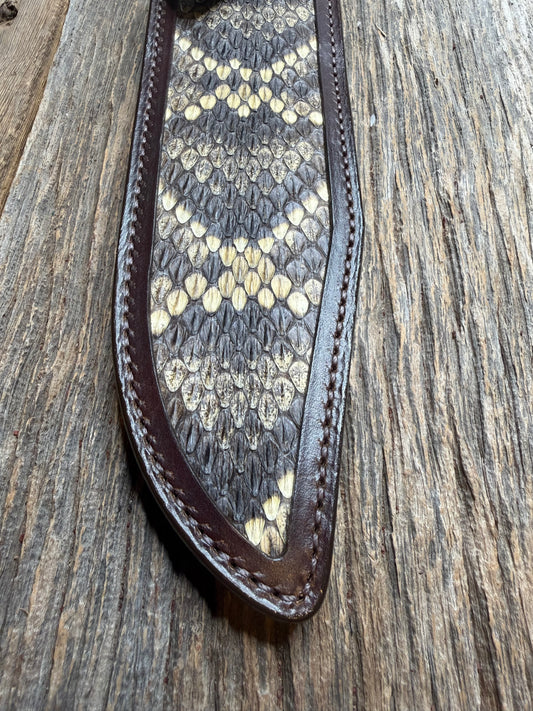 Randall Model 12-9 sheath with an Eastern Diamondback RattleSnake skin from Treeman Sheaths. Hand tooled belt loop, canteen snap. Vibrant colors and one of the hardest skins to source.