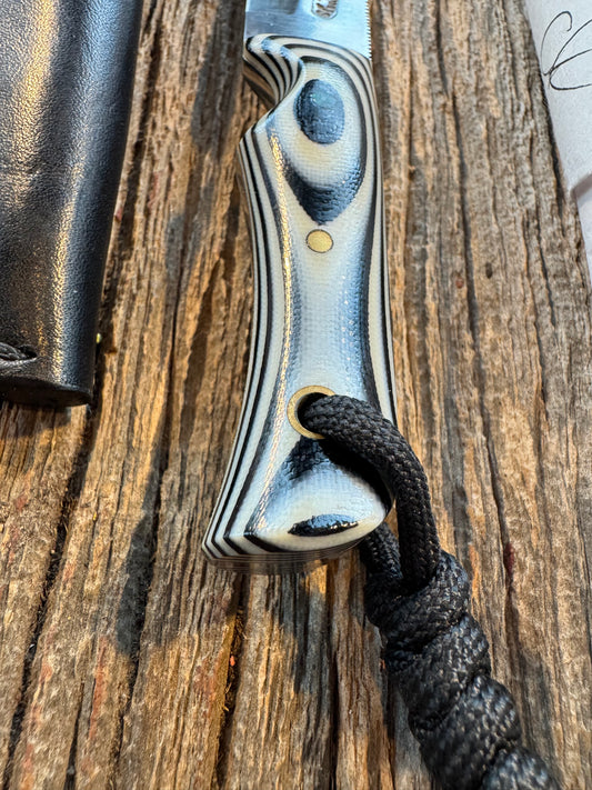 New in Paper Randall Knife Model 10-3 Fisherman Black and white Swirl in Micarta, Stainless Steel. Lanyard.