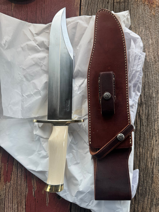 New in Paper Model 12-11 Smithsonian “Smitty” Bowie. Beautiful Dave Warthers Resin with a single finger grip and a Brass forward curved hilt and brass butt cap.