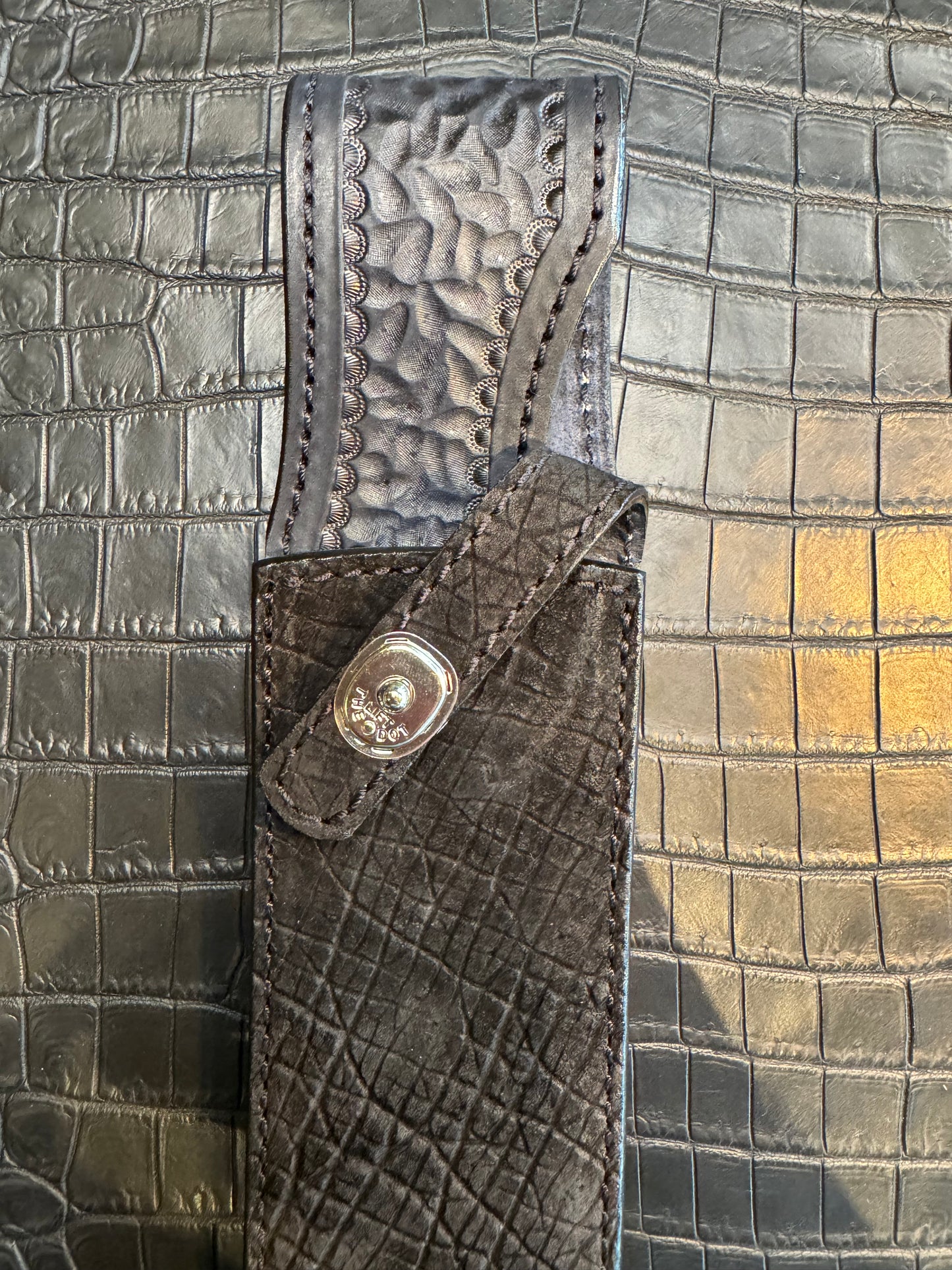 Randall Model 12-9 Bowie Clip Point in Black Hippo, forward curved hilt, Canteen Snap, full brass stamping and stitching.