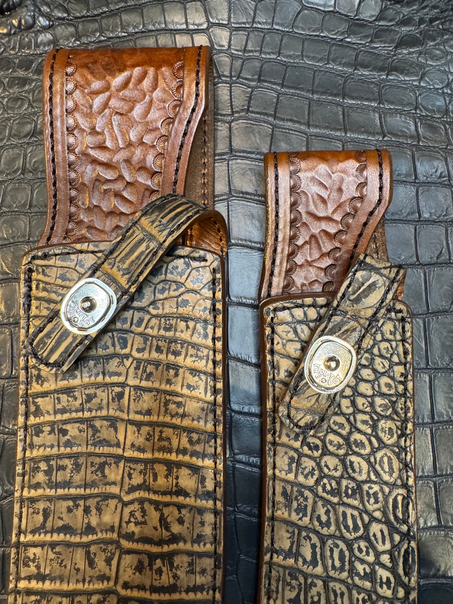 A pair of Randall Model 12-11 Large Sasquatch and Randall Model 12-8 Small Sasquatch Sheaths in Exotic Antique Brown Crocodile by Treeman.