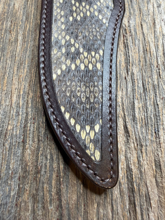 Randall Model 12-8 sheath with an Eastern Diamondback RattleSnake skin from Treeman Sheaths. Hand tooled belt loop, canteen snap. One of the hardest skins to source.