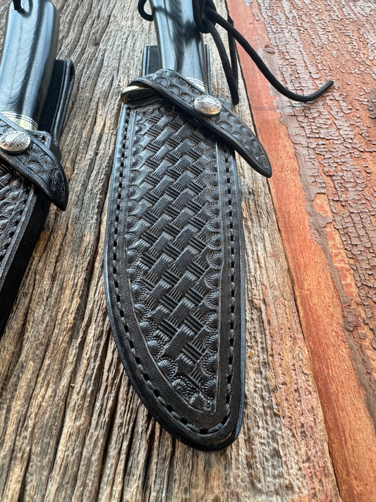 Stanaback Special in Black Micarta. This is the large Stanaback with a Stainless 4 1/2” Blade, Nickel Silver Single Hilt with Aluminum & Black Spacers. Compass in the butt and a Lanyard.