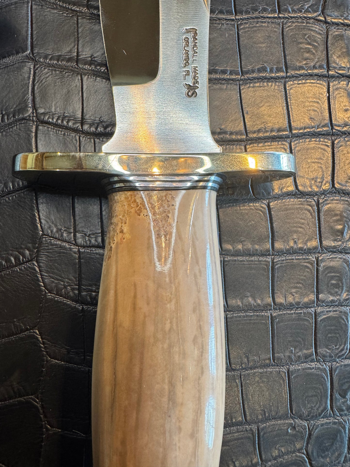 Randall Model 12-8 Big Bear in a gorgeous piece of Creamy Fossil Walrus Ivory. Nickel Silver Hilt and a natural exposed end.