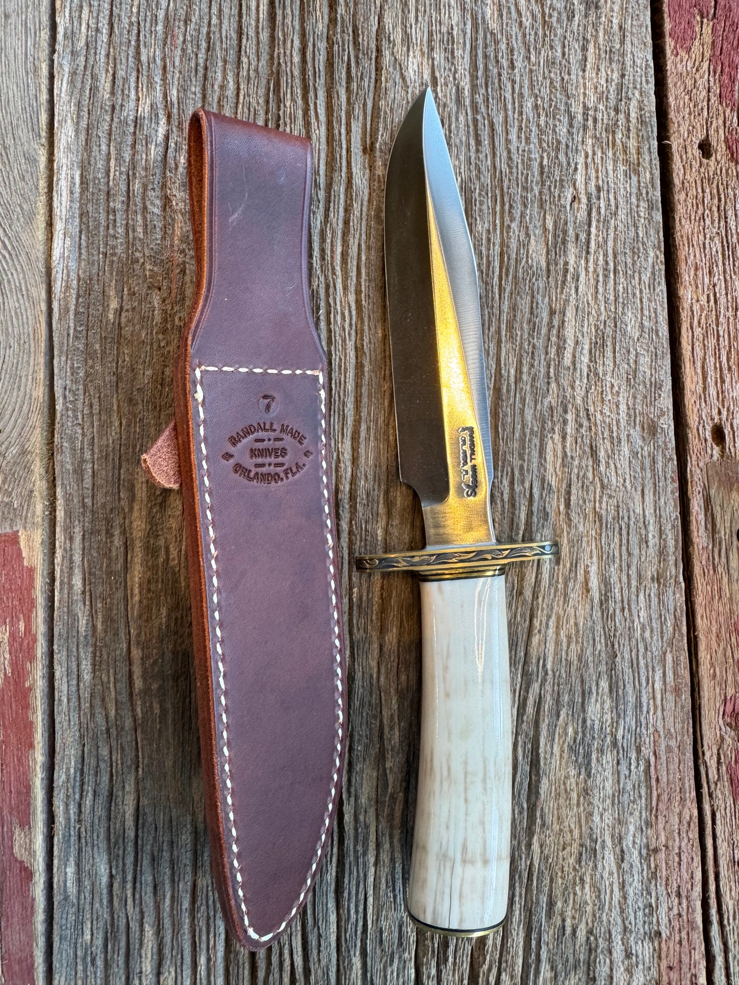 Randall Knife Model 1-7 FWI Handle. Jere Davidson engraved into Brass. Stainless Steel Blade. Stunning knife.