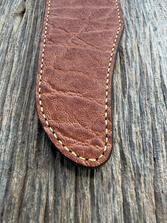 New Randall Model 12-11 Confederate Sheath in Exotic thick and textured Rust colored Elephant hide on brown leather from Treeman with a silver Canteen snap. Hand tooled belt loop. Killer sheath.