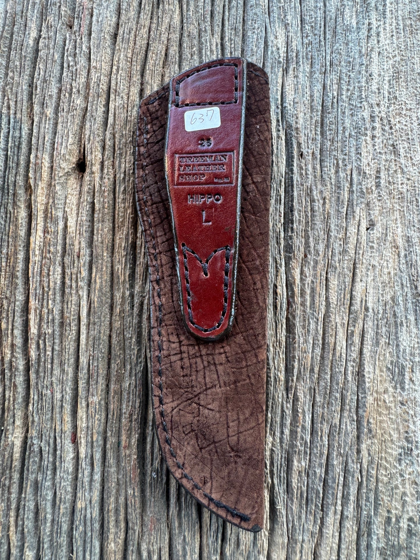 Randall Model 26 Sheath in Exotic Chocolate Hippo Throat style from Treeman. This is a left hand sheath.