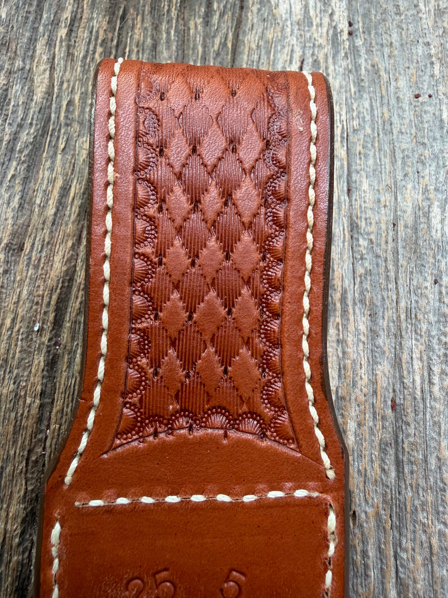 Pristine Randall Model 25-5 sheath in Exotic Cape Buffalo leather from Sullivans by Gutcher. Heavily tooled belt loop and strap. Randall snap and clean stamping on the back … perfect!!