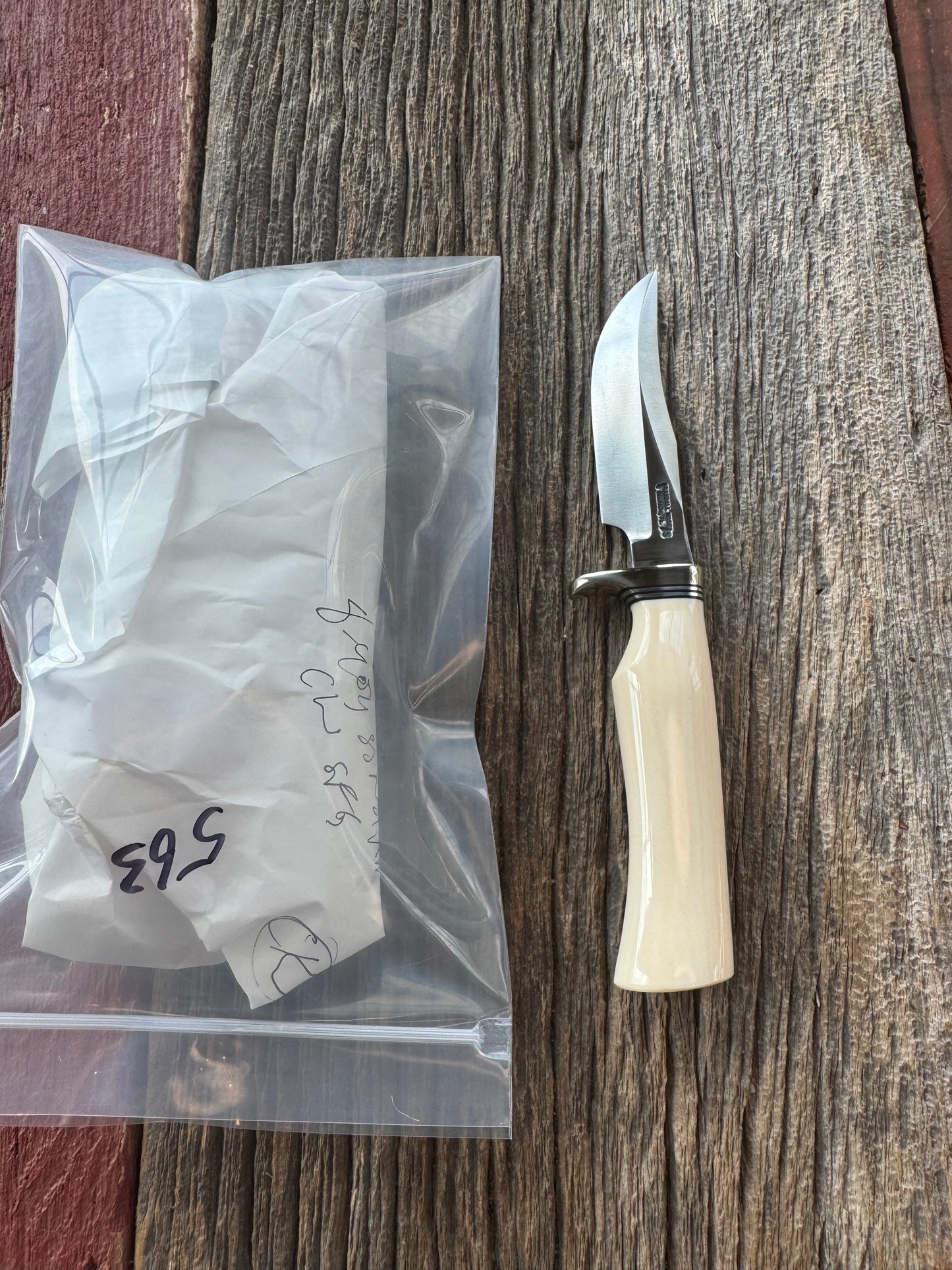 New in paper Randall Model 8-4 with a nice piece of customer supplied Dave Warthers Resin with a single finger grip. Stainless Steel, Nickel Silver Single Hilt and a raw natural end.