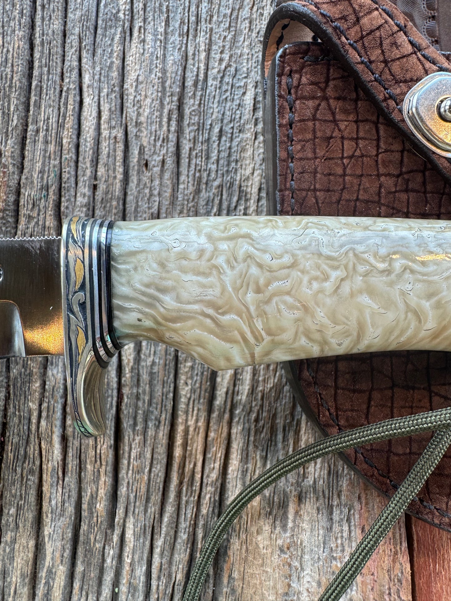 Randall Model Bowles Skinner Dealer Special Knife, perfect Musk Ox. This knife is a one of 4 per Rick Bowles. Beautifully engraved by Jere Davidson and adorned with gold and silver inlays.