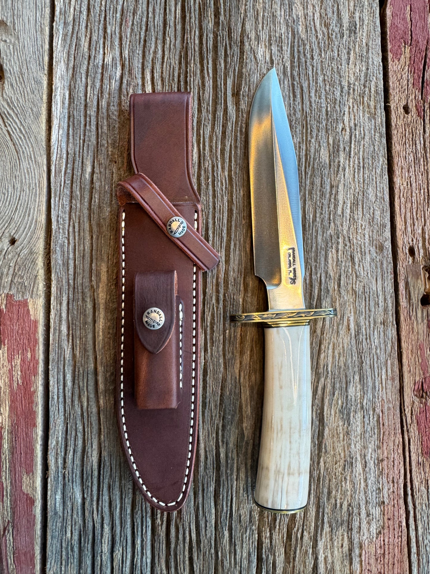 Randall Knife Model 1-7 FWI Handle. Jere Davidson engraved into Brass. Stainless Steel Blade. Stunning knife.