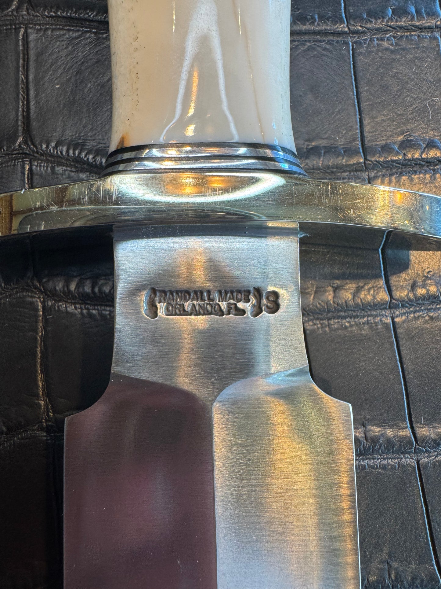 Randall Tom Clinton Dealer Special in a gorgeous piece of Creamy Fossil Walrus Ivory. Nickel Silver Hilt and Aluminum Flanged Butt cap.
