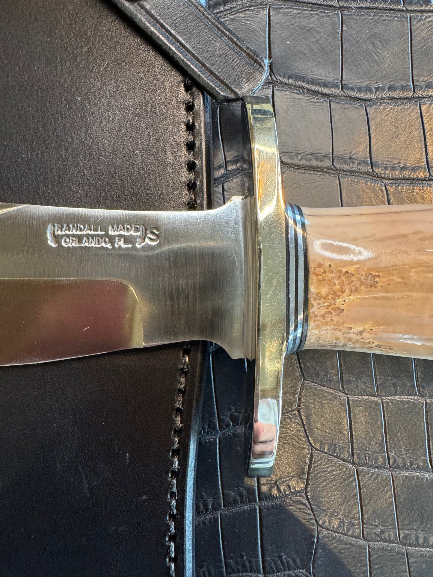Randall Model 12-8 Big Bear in a gorgeous piece of Creamy Fossil Walrus Ivory. Nickel Silver Hilt and a natural exposed end.