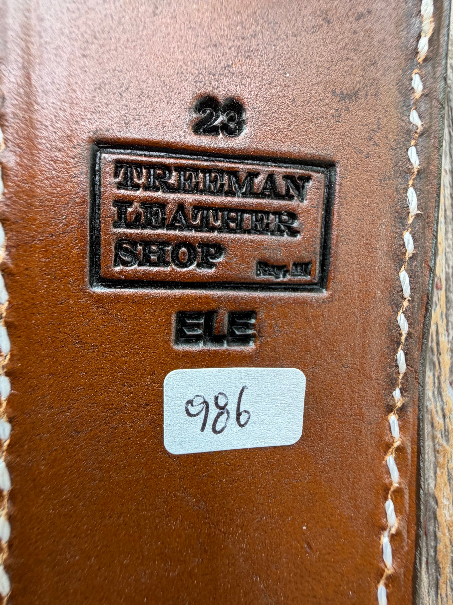 New Randall Model 23 Sheath in Exotic thick and textured Black and Grey Elephant Ear on brown leather from Treeman with a silver Canteen snap. Hand tooled belt loop. Killer sheath.