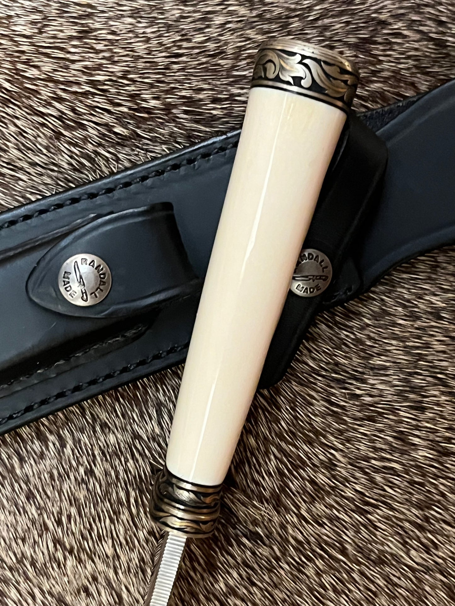 Model 4-7” Big Game and Skinner Elephant Ivory that is Flawless Engraved by Master Engraver Jere Davidson with Gold Inlay Only