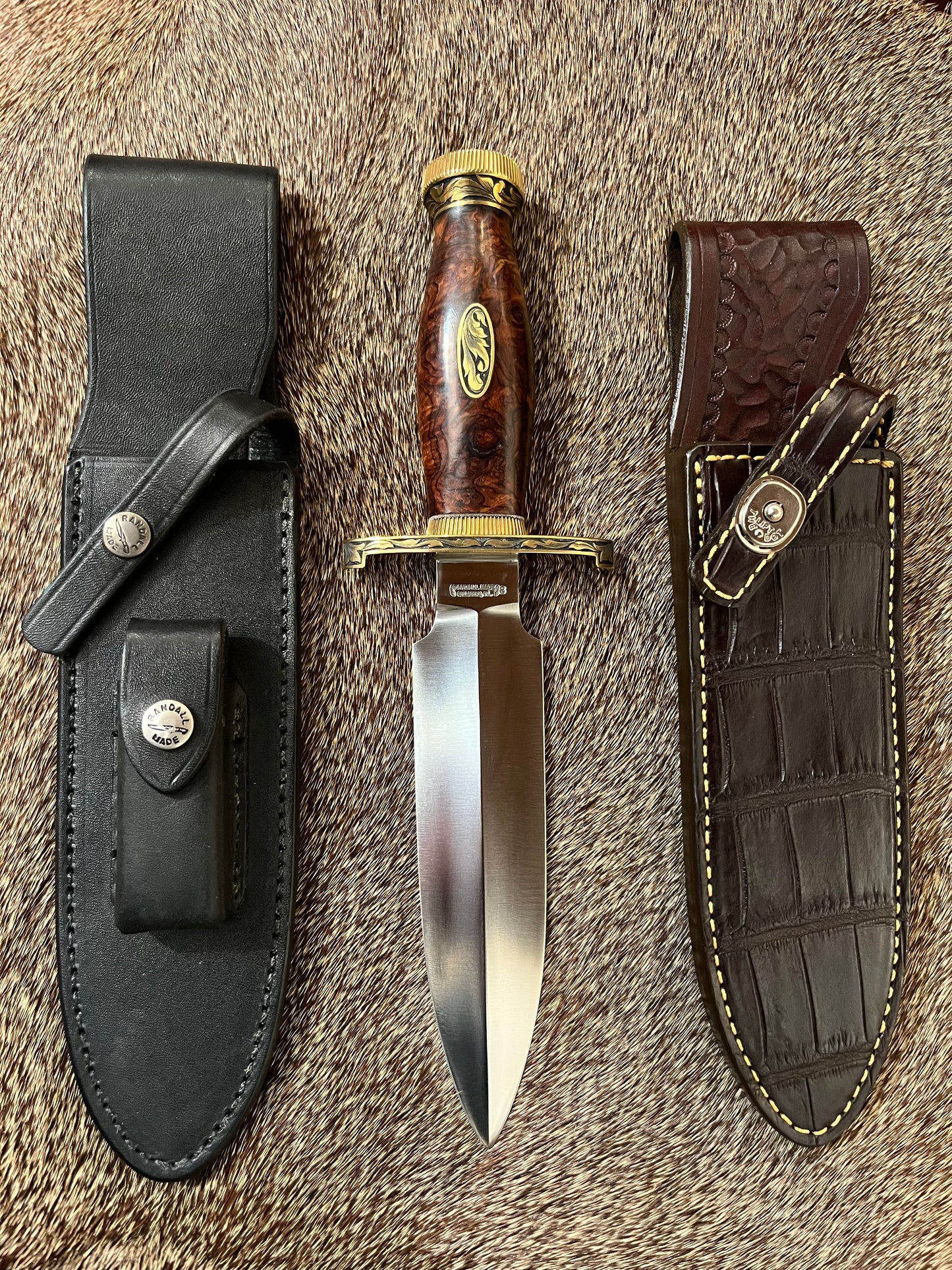 TC Special with Honduran Rosewood, Brass Lugged Hilt, Flanged Brass Butt Cap, Scalloped Brass Collar. Engraved by Master Engraver Jere Davidson