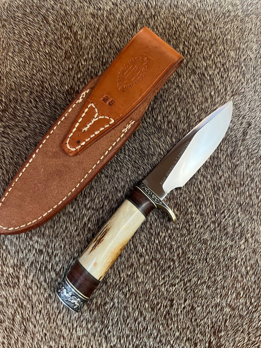 Model 25-Trapper 5” Tom Leschorn Carved, with Alaskan Gold Nugget Carved into a Buffalo