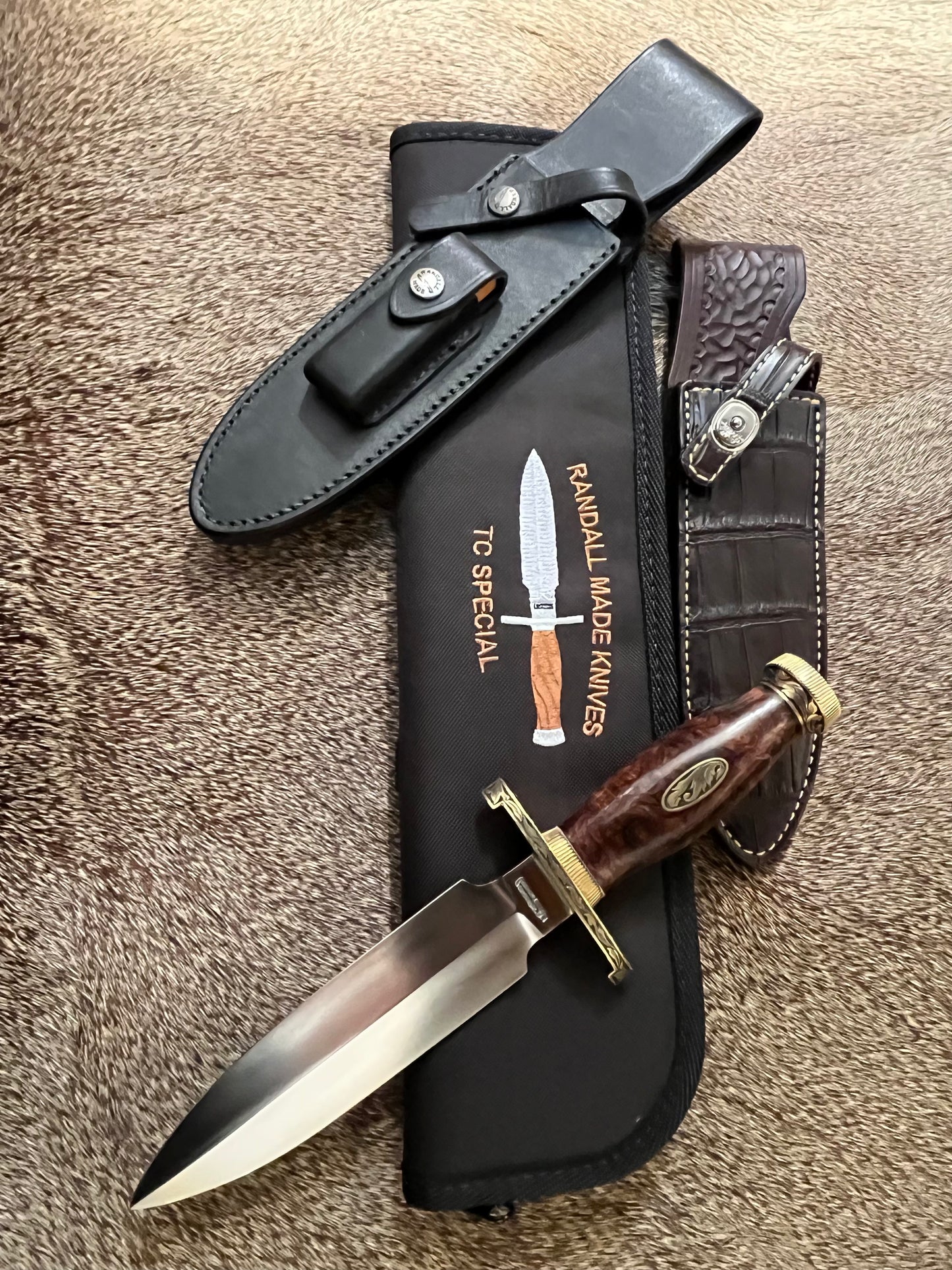 TC Special with Honduran Rosewood, Brass Lugged Hilt, Flanged Brass Butt Cap, Scalloped Brass Collar. Engraved by Master Engraver Jere Davidson