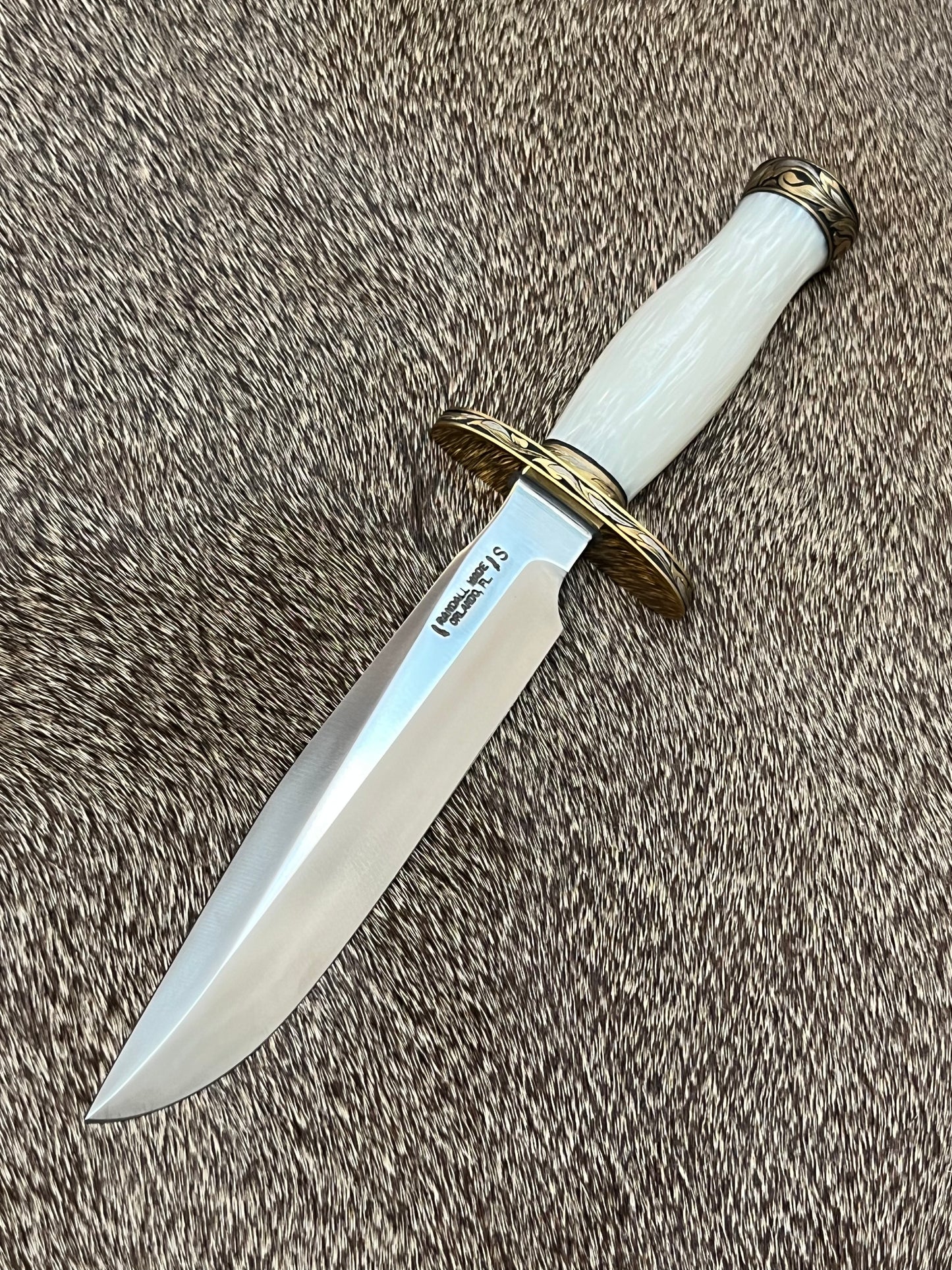 Model 1-7” All Purpose Fighting Knife, Engraved by Master Engraver Jere Davidson with Fine Silver Inlays, comes with Custom Black Leather Tooled Gutcher Sheath