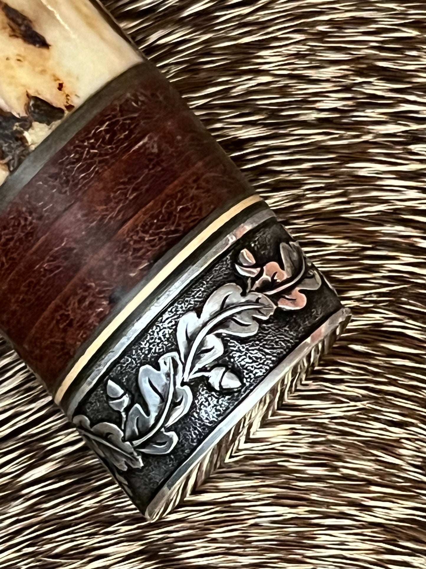 Model 25-Trapper 5” Tom Leschorn Carved, with Alaskan Gold Nugget Carved into a Buffalo