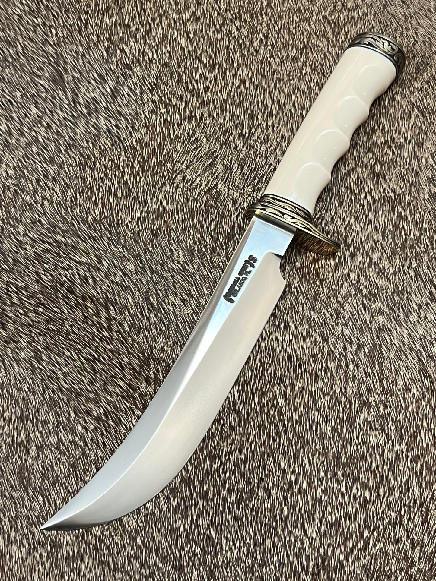 Model 4-7” Big Game and Skinner Elephant Ivory that is Flawless Engraved by Master Engraver Jere Davidson with Gold Inlay Only